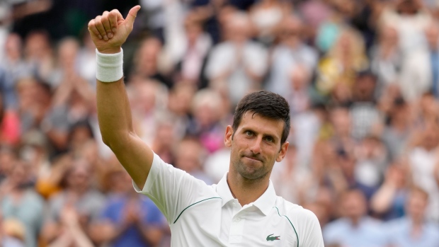 Djokovic advances to second round at Wimbledon