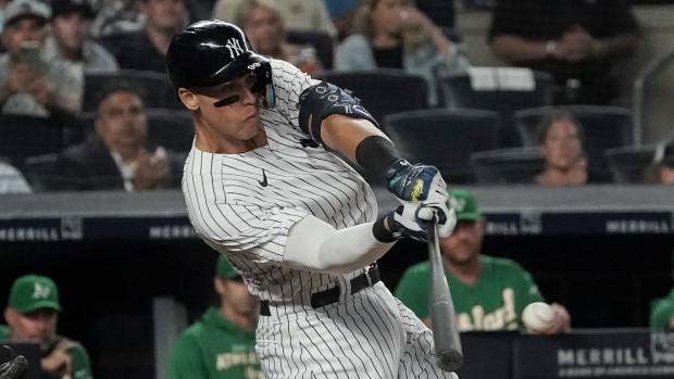 Best-in-MLB Yankees top worst-in majors A's on late rally