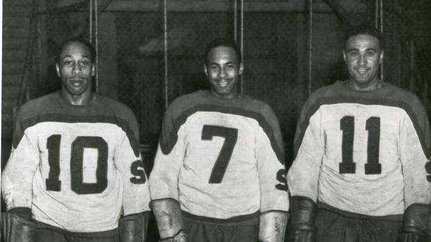 Ossie Carnegie (#10), Herb Carnegie (#7) and Manny McIntyre (#11)