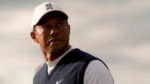 Woods leads PGA Tour players in LIV battle