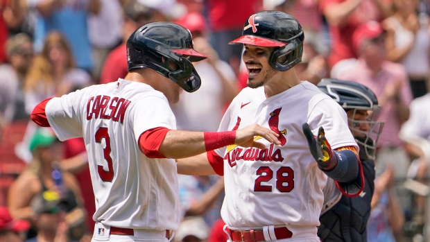 Dylan Carlson and Nolan Arenado, The Canadian Press Dylan Carlson and Nolan Arenado