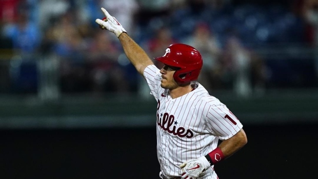 Realmuto, Wheeler lead Phillies past Marlins for sixth in row