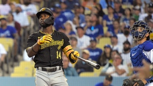 Pirates' Castro has phone fly from back pocket during slide