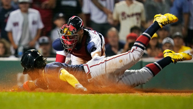 Riley's big night lifts Braves over Red Sox in extras