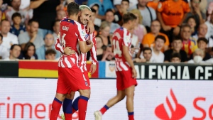 Griezmann comes in to net Atlético's winner against Valencia