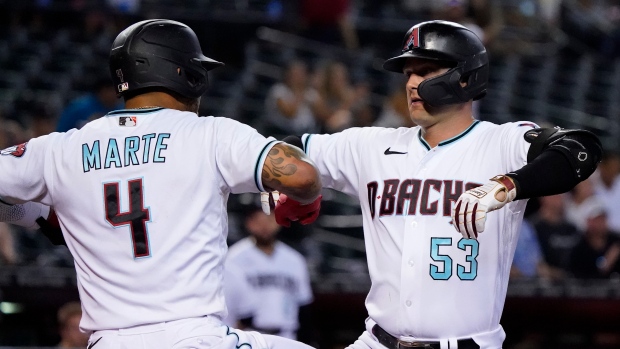 Ketel Marte Christian Walker, The Canadian Press Ketel Marte Christian Walker