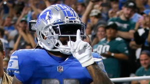 Report: Lions RB Swift (shoulder) could miss time