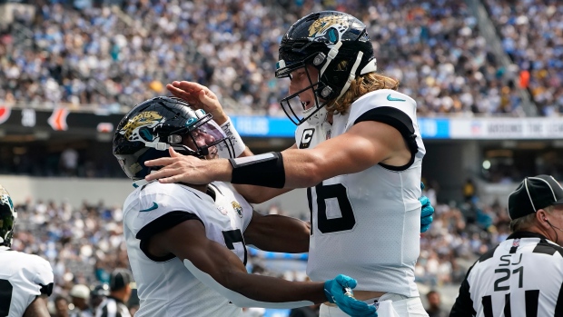 Zay Jones and Trevor Lawrence , The Canadian Press Zay Jones and Trevor Lawrence