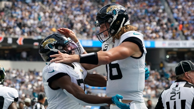 Zay Jones and Trevor Lawrence 