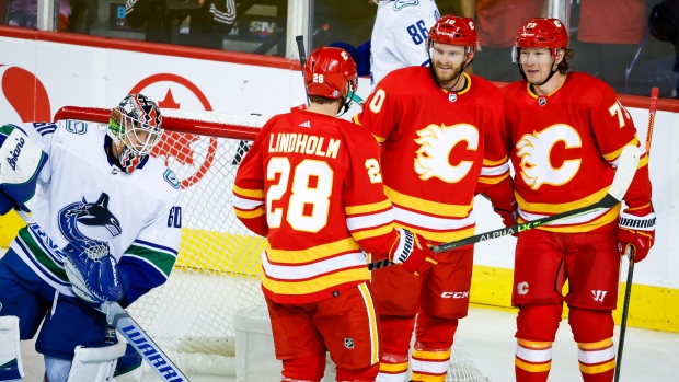 Huberdeau flexes offensive muscle in Flames win over Canucks