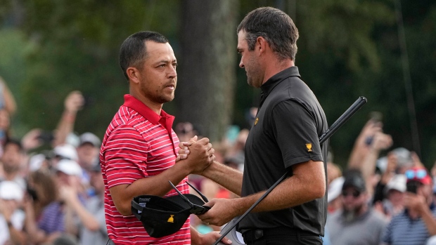 Xander Schauffele and Corey Conners, The Canadian Press Xander Schauffele and Corey Conners