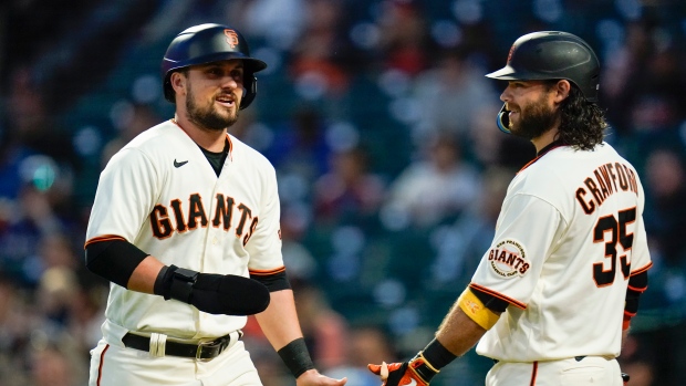 J.D. Davis, Brandon Crawford, The Canadian Press J.D. Davis, Brandon Crawford
