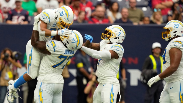 Austin Ekeler Los Angeles Chargers celebrate, The Canadian Press Austin Ekeler Los Angeles Chargers celebrate