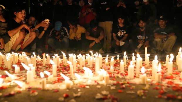 Vigil for victims of tragedy at soccer game in Indonesia, The Canadian Press Vigil for victims of tragedy at soccer game in Indonesia