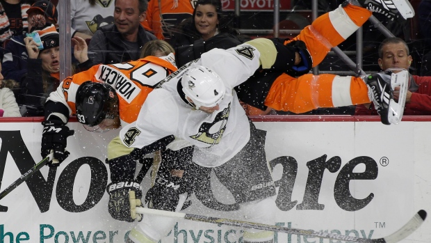 Scuderi checks Voracek, The Canadian Press Scuderi checks Voracek