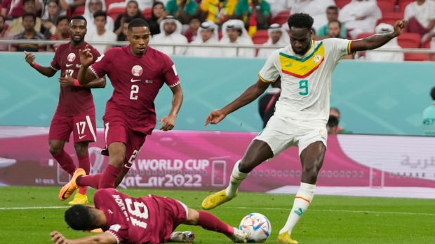 Qatar loses to Senegal as host nearing World Cup exit