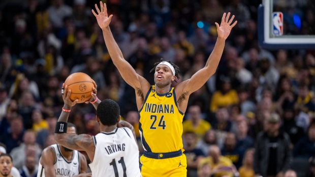 Buddy Hield and Kyrie Irving , The Canadian Press Buddy Hield and Kyrie Irving