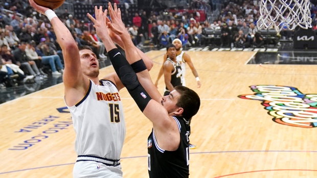 Nikola Jokic, Ivica Zubac, The Canadian Press Nikola Jokic, Ivica Zubac