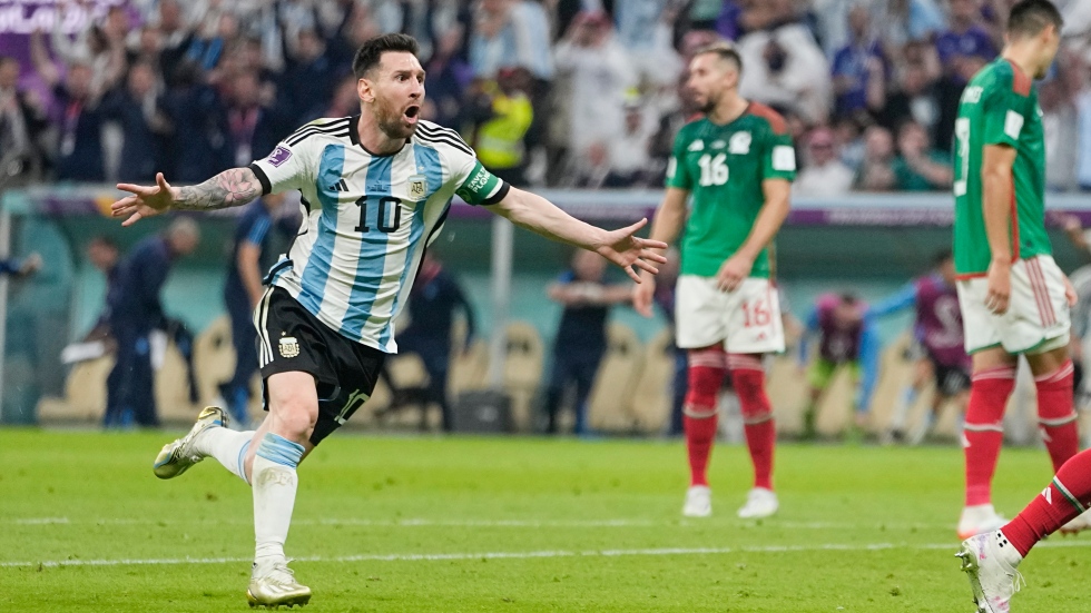 Messi has his moment as Argentina downs Mexico to stay alive at FIFA World Cup