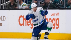Canucks reach two-year, $11M extension with Kuzmenko