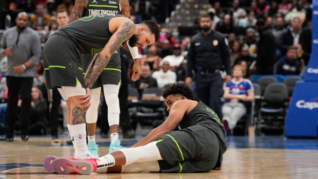 Austin Rivers Karl-Anthony Towns, The Canadian Press Austin Rivers Karl-Anthony Towns