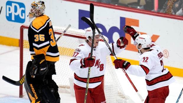Brett Pesce (22) and Andrei Svechnikov, The Canadian Press Brett Pesce (22) and Andrei Svechnikov