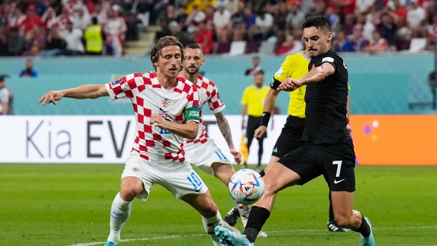 Luka Modric, Stephen Eustaquio, The Canadian Press Luka Modric, Stephen Eustaquio
