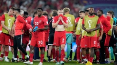 Canada's players react after losing in the World Cup 