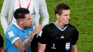 Uruguay players charged for confronting World Cup referee