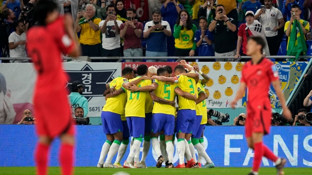 Stylish Brazil romps into quarter-finals