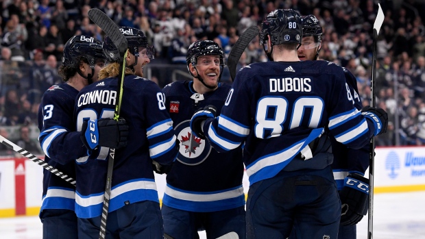 Connor scores twice, Jets top Panthers in Maurice's return