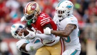 Photo: The Canadian Press, License: N/A, Created: 2022:12:04 15:04:48 Jevon Holland, Xavien Howard and Deebo Samuel
