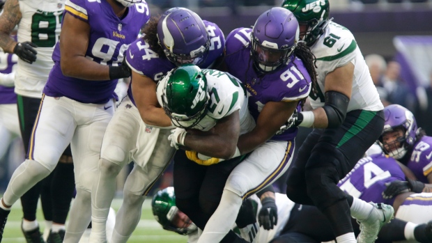 Zonovan Knight, Eric Kendricks and , The Canadian Press Zonovan Knight, Eric Kendricks and