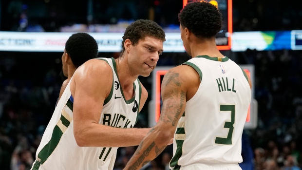 Brook Lopez George Hill, The Canadian Press Brook Lopez George Hill