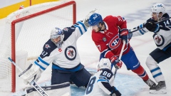 Connor Hellebuyck Kirby Dach
