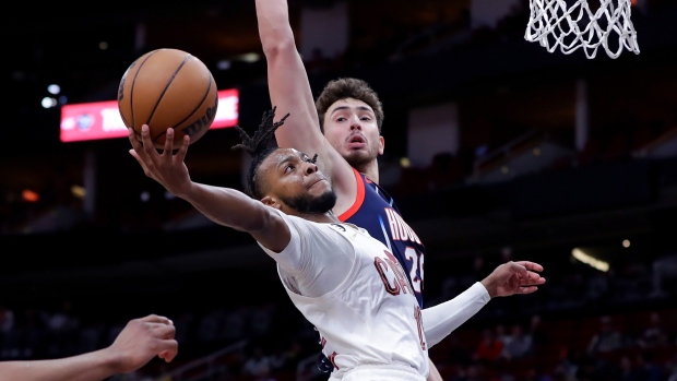 Garland, shorthanded Cavaliers race past Rockets