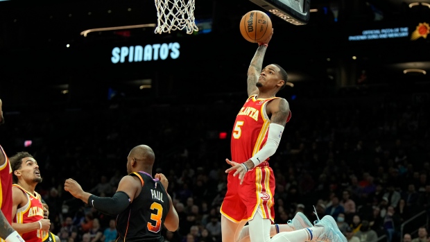 Murray scores 21 points as Hawks roll past Suns