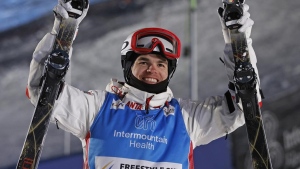 Canada's Kingsbury defends dual moguls world title