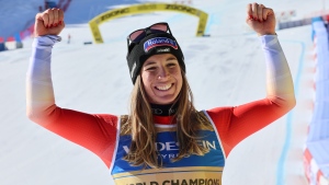 Swiss skier Flury takes downhill gold as favorites falter