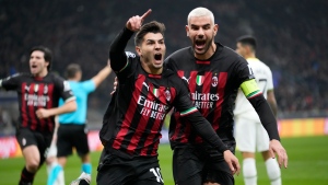 Milan beats Tottenham for winning return to CL knockout stage