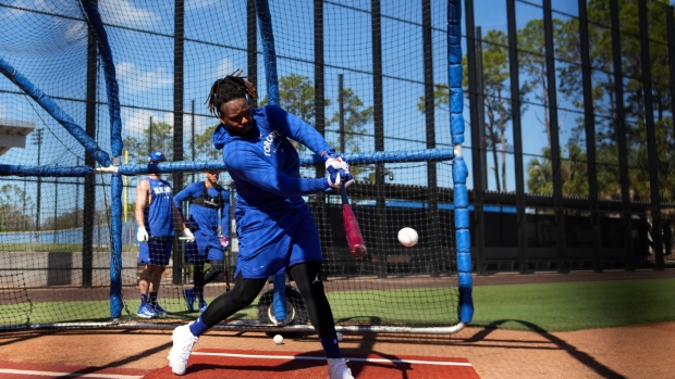 Vladdy Jr. focusing on pitch selection, not payday