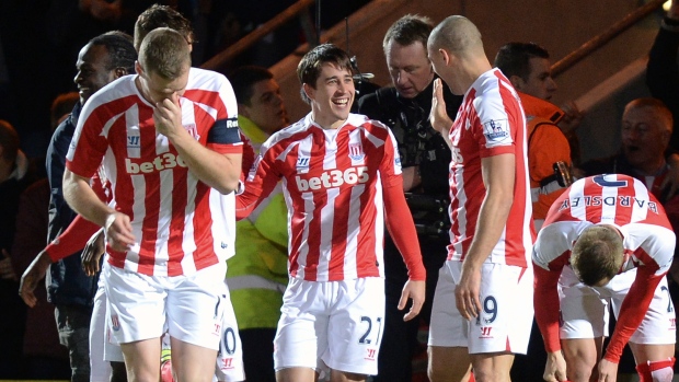Stoke players celebrate, The Canadian Press Stoke players celebrate