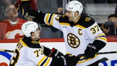 Charlie McAvoy Patrice Bergeron