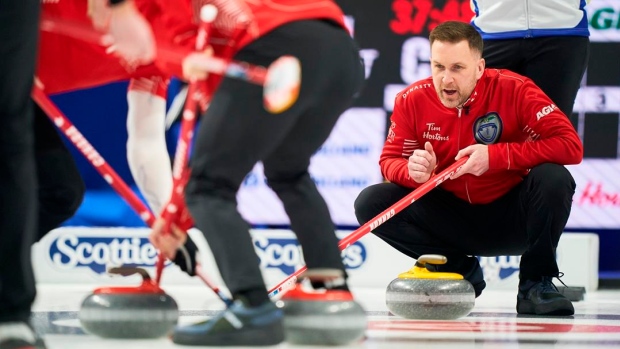 Defending champion Gushue wins opening game at the Tim Hortons Brier