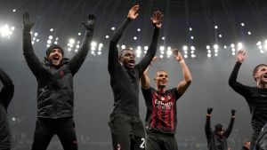 AC Milan reaches CL quarters after draw with Spurs