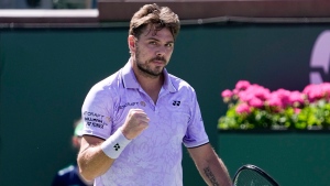 Wawrinka wins in return to Indian Wells after four years away; Murray advances