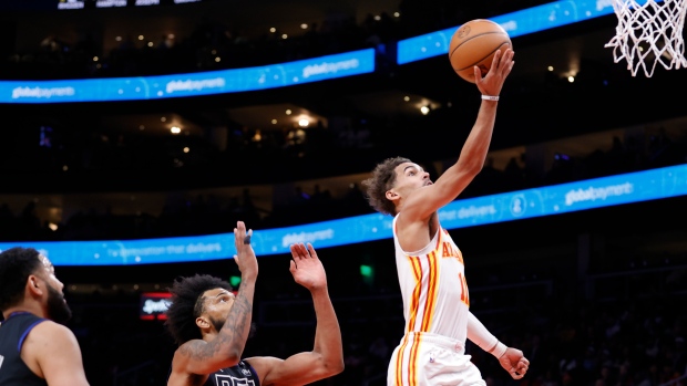 Young scores 30 as Hawks complete sweep of Pistons