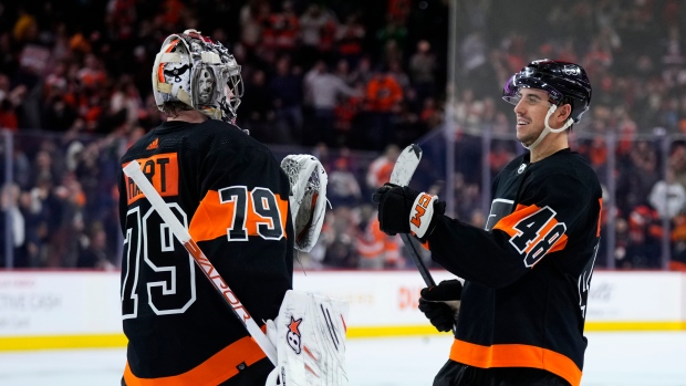 Tortorella earns 700th career win, Flyers top Wild