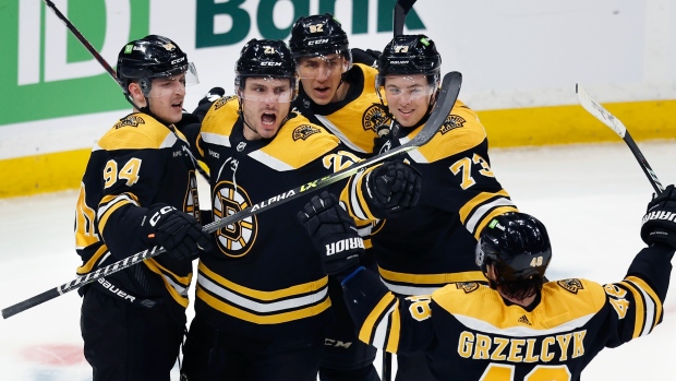 NHL-best Bruins clinch Atlantic with win over Lightning