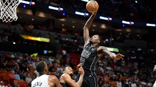 Nets embarrass Heat, move back into sixth